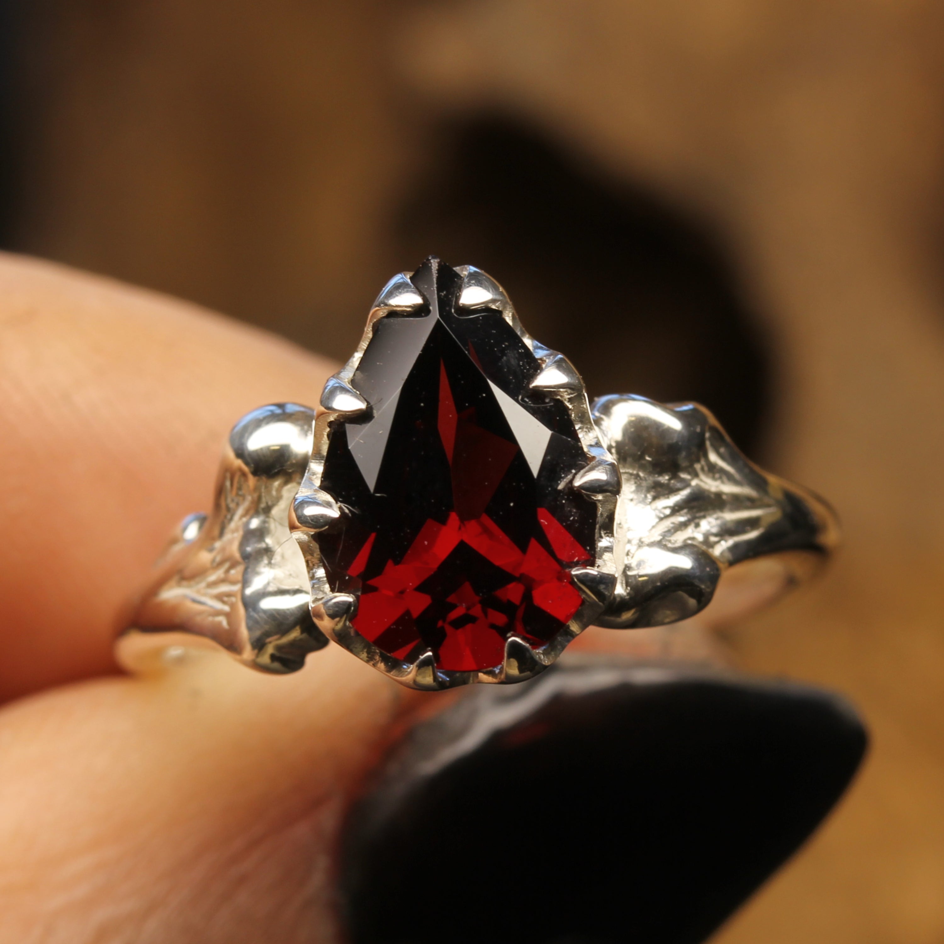 Silver Skull Bone Engagement Ring set with Pear cut red Garnet