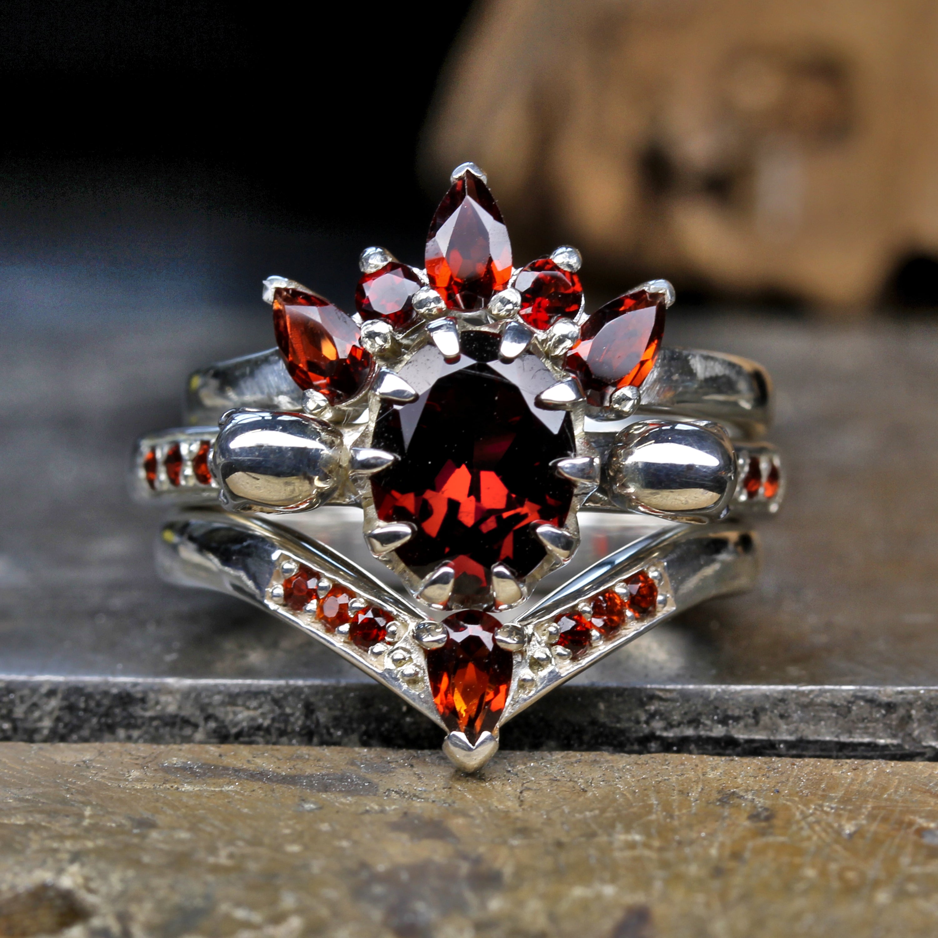Garnet Triple Stack rings. Top ring is Eternity; Centre ring is Engagement; Lower ring is Wishbone wedding.