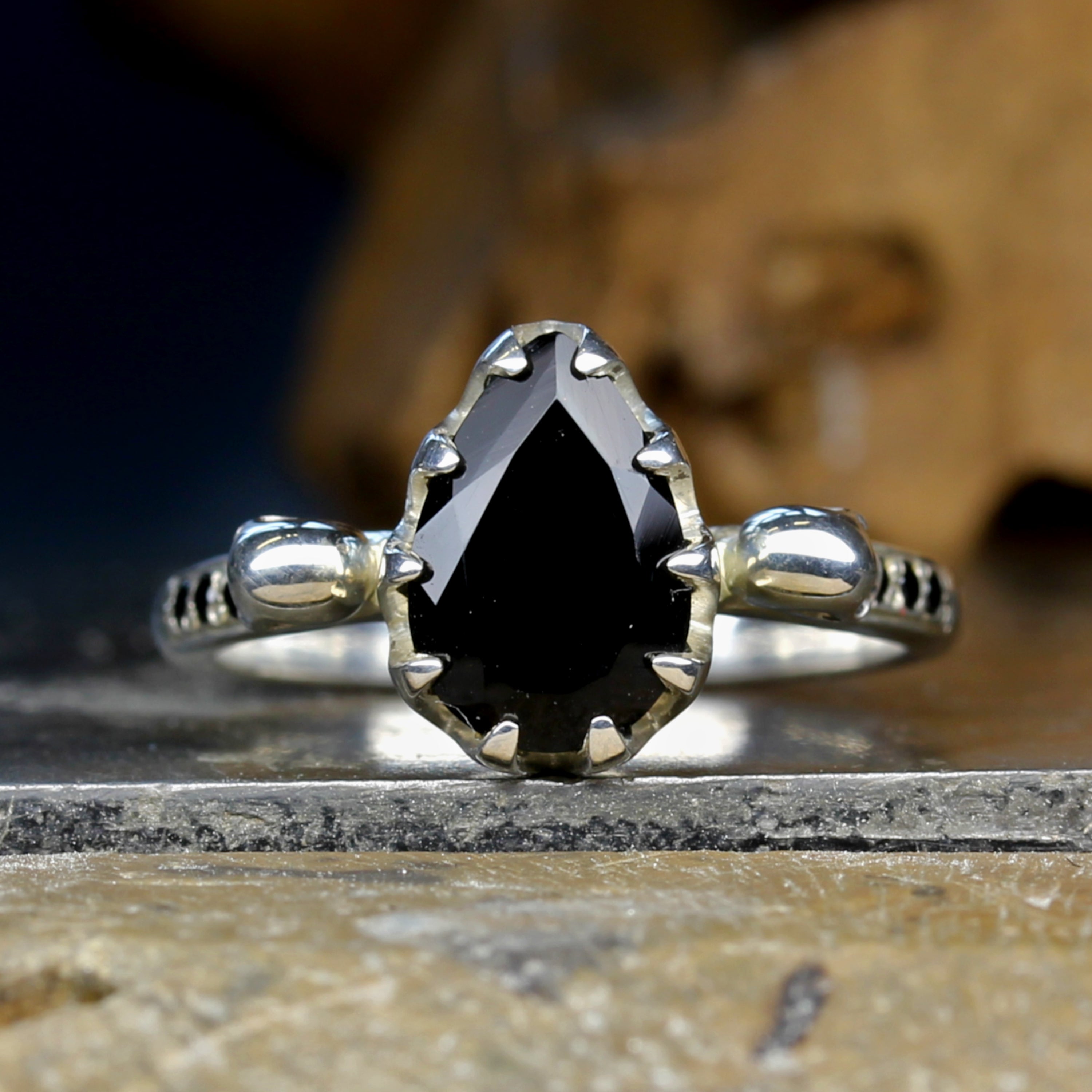Gothic Skull Engagement Ring with Pear Cut Black Onyx centre gemstone.