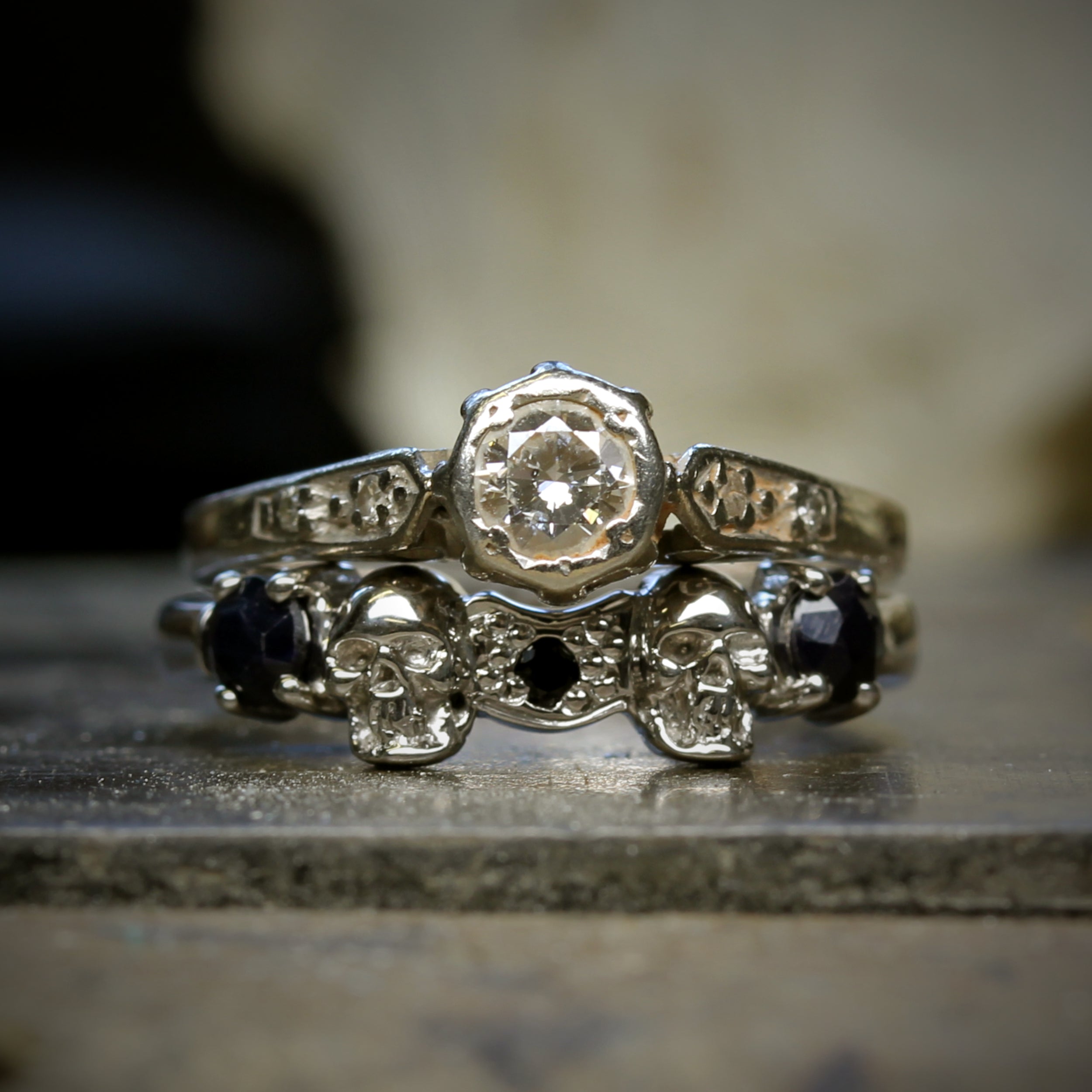 Skull wedding ring and engagement ring paired together