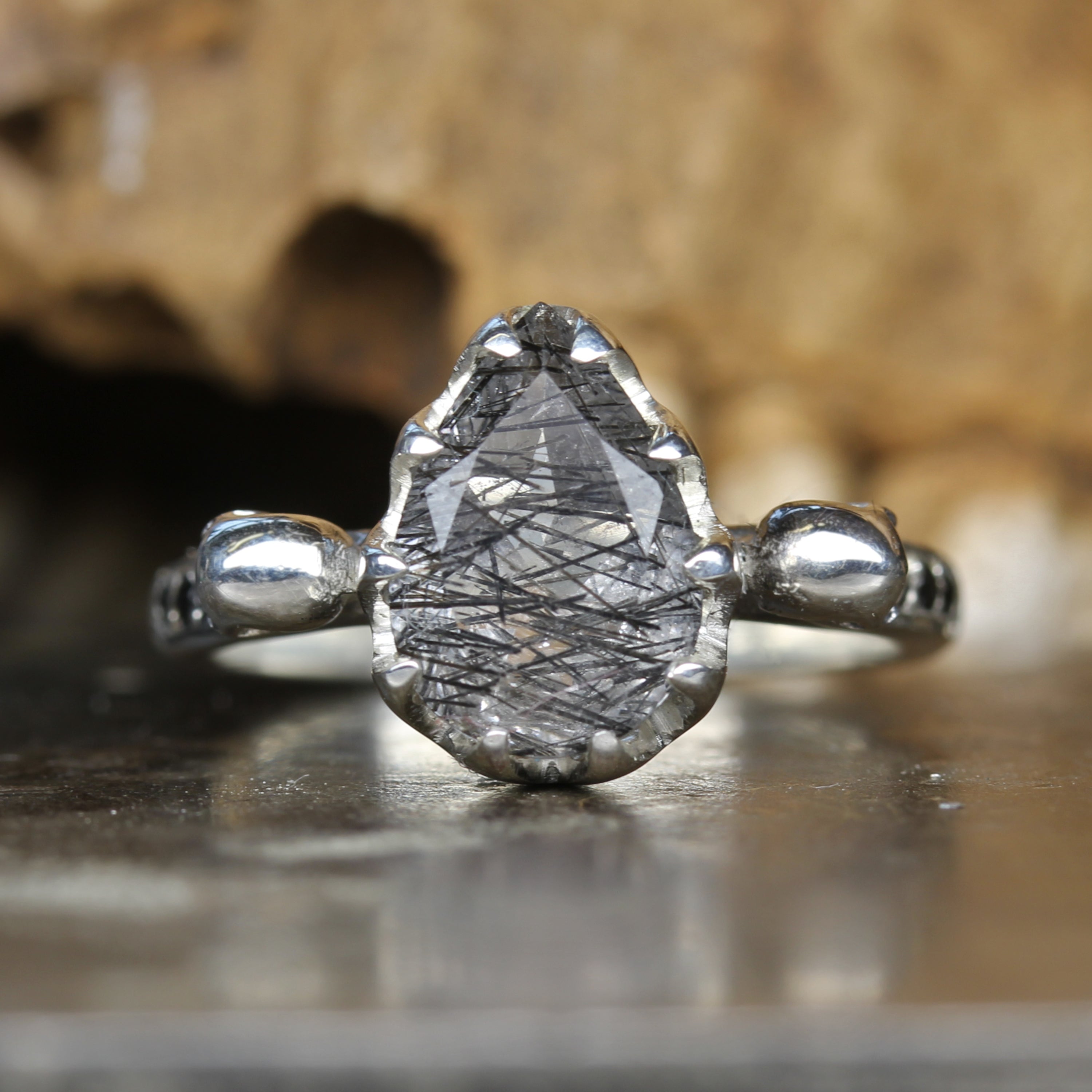 Silver Skull Engagement Ring set with Pear Shaped Tourmalated Quartz