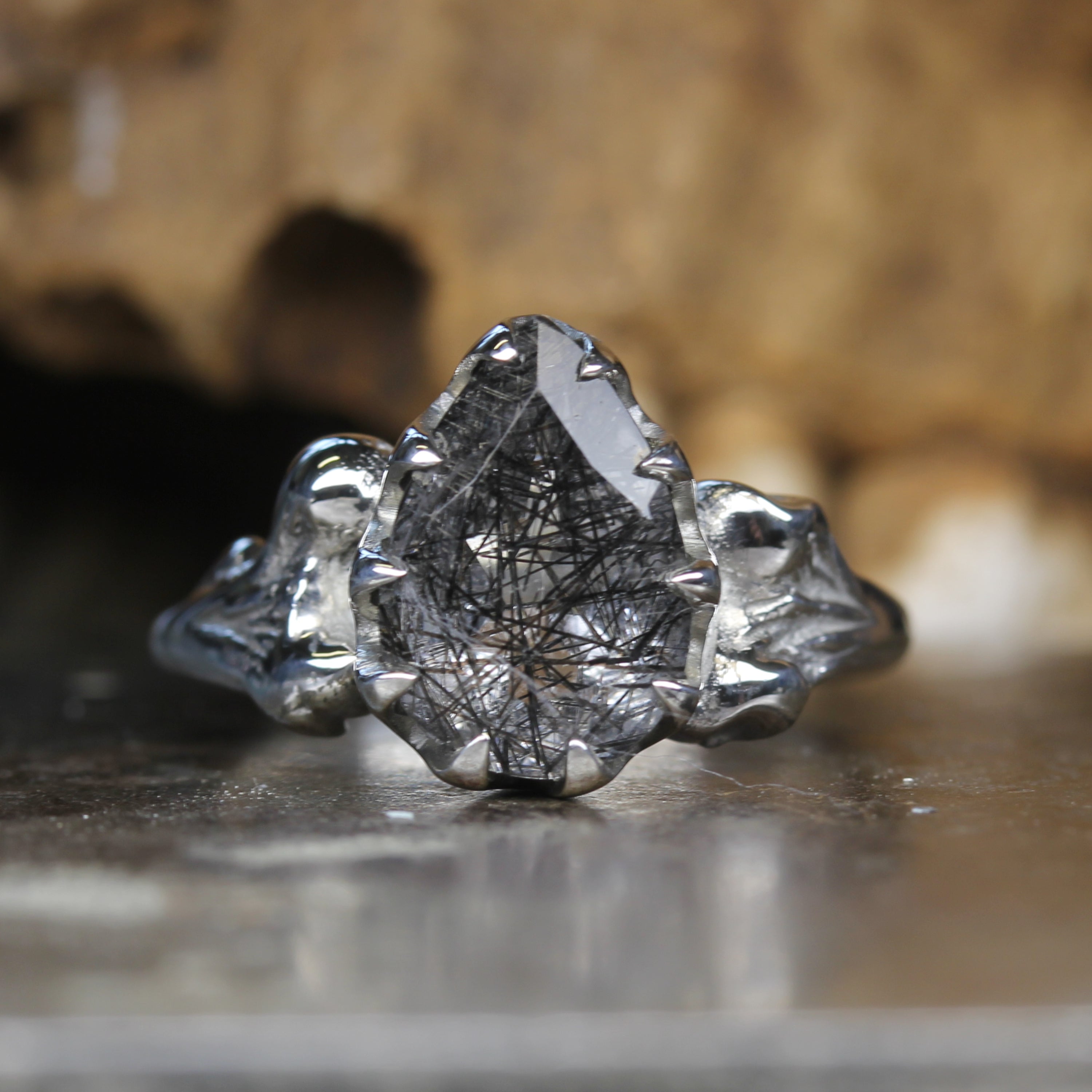 Silver Bone Engagement Ring set with Pear Shaped Tourmalated Quartz