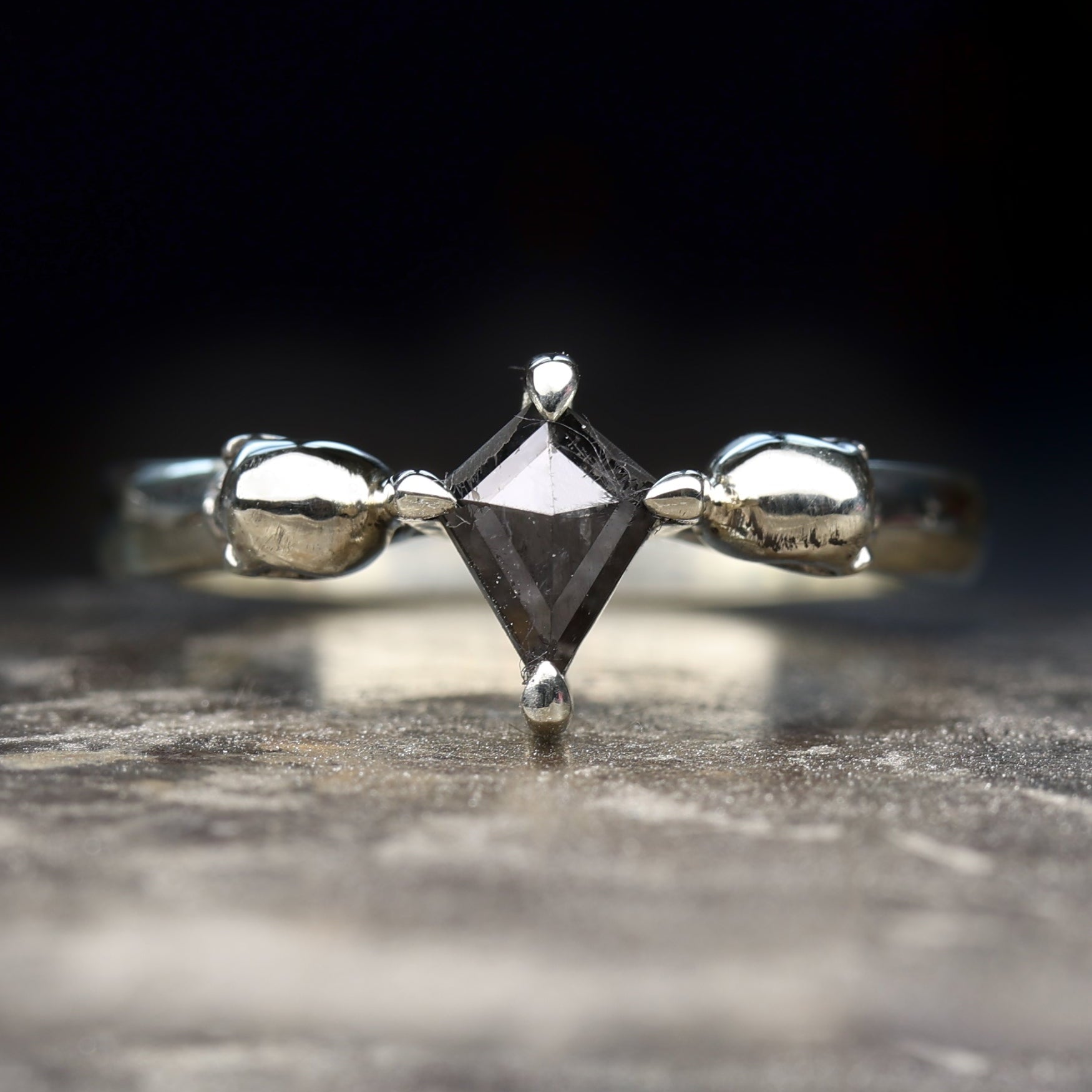 White Gold skull engagement ring set with kite salt and pepper diamond