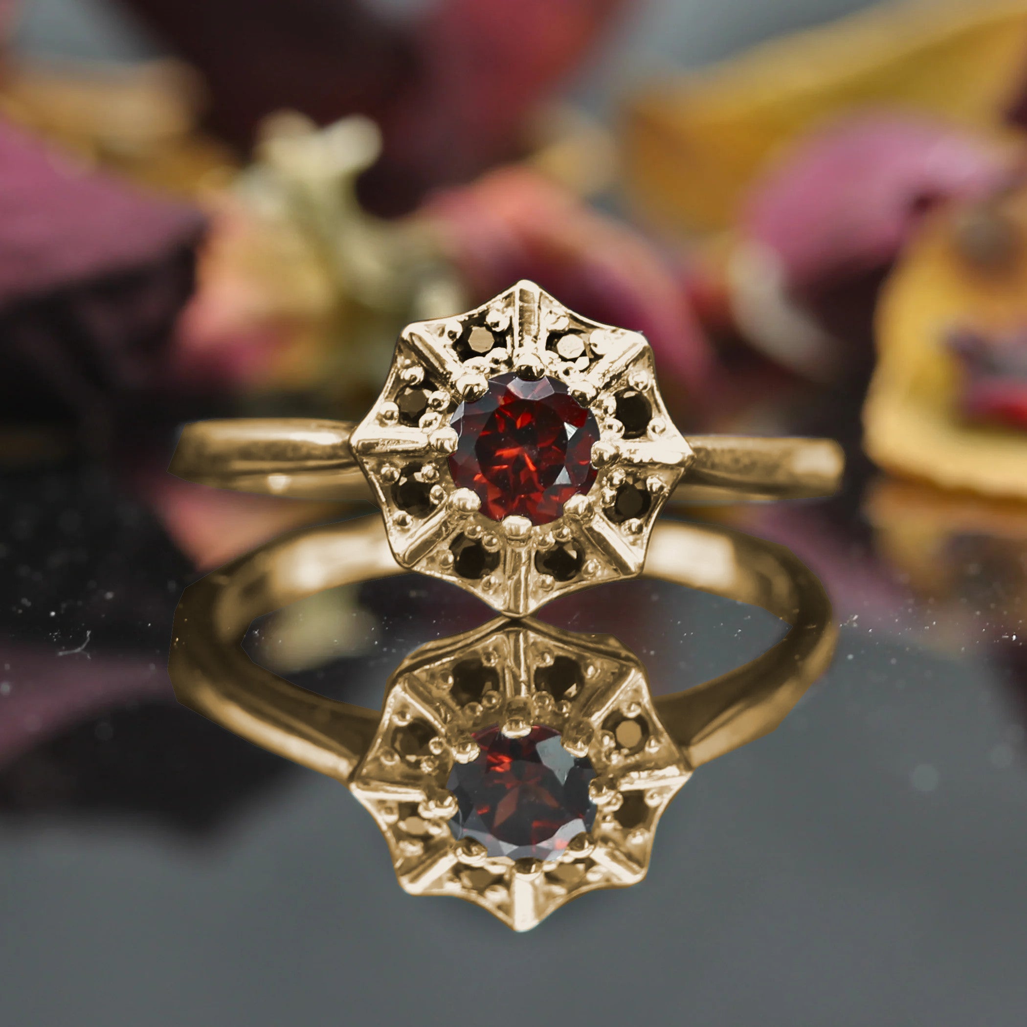 Yellow Gold Gothic Spider Web Ring set with Red Garnet gemstone.