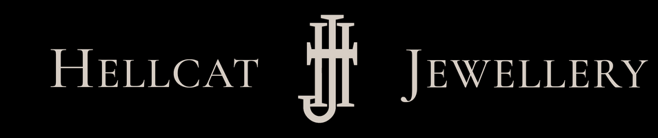 Hellcat Jewellery logo on a black background, featuring the brand name in serif lettering with a central monogram symbol.